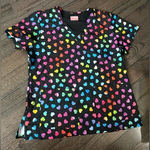 Heart scrub top. Size large. 2 front pockets. Classic fit